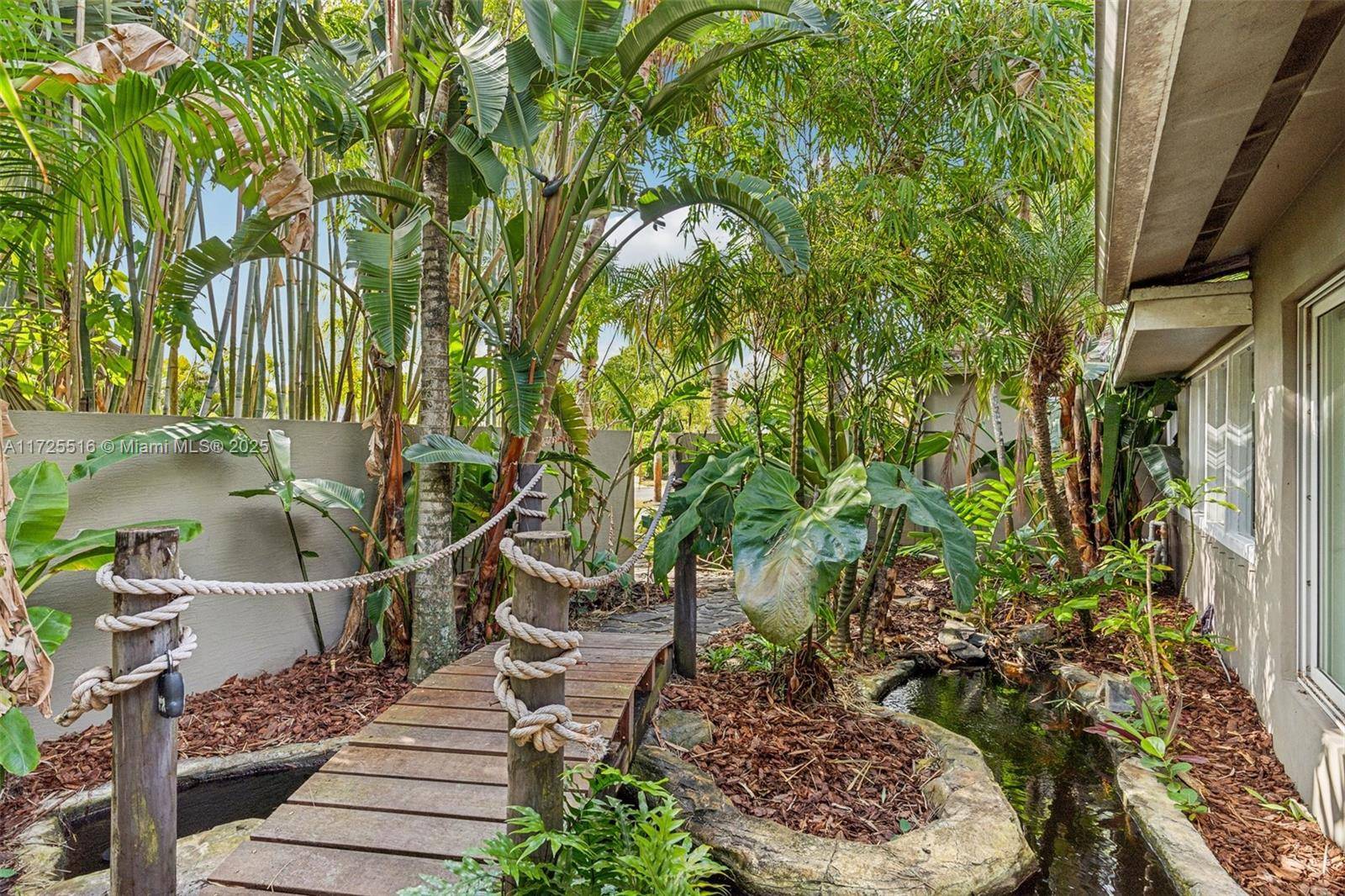 This stunning 3 bedroom, 2 bath home with a convertible TV room, perfect as a third bedroom, offers tranquility and luxury in Wilton Manors.