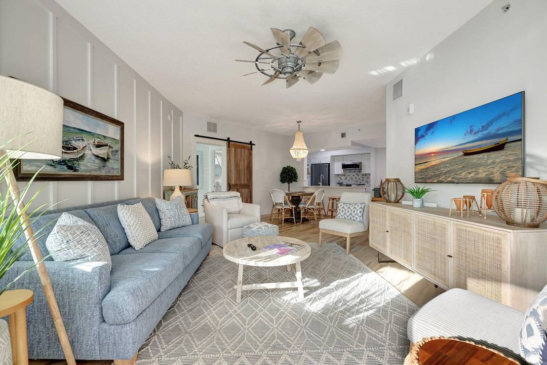 Experience waterfront luxury at The Harborage Yacht Club amp ; Condos in this fully furnished, turnkey 2 bedroom, 2 bath penthouse condo, beautifully renovated with modern beach cottage charm.