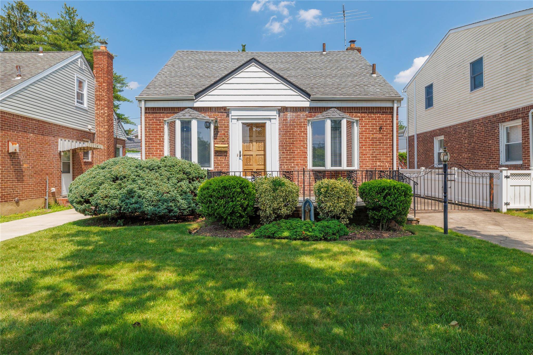 Welcome to this lovingly maintained expanded 4 bedroom, 1 bath Cape, nestled in one of New Hyde Park's most sought after neighborhoods.