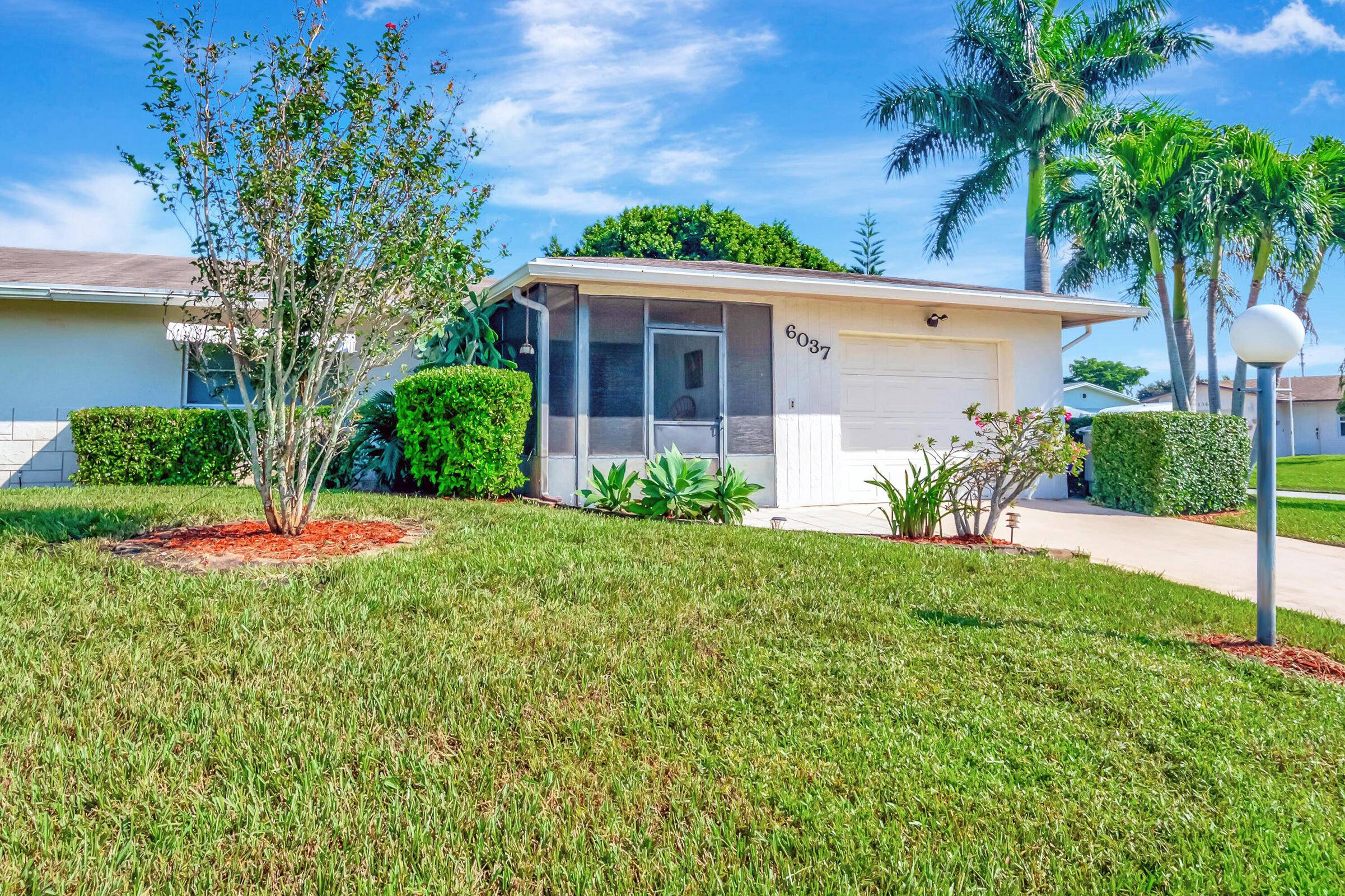 This beautifully maintained home located in Delray Villas 4 5 has a nice South East facing corner lot and is only steps to the main clubhouse area.