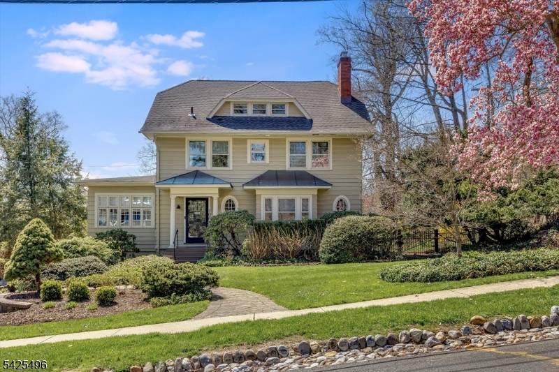 Elegance, history, and thoughtful design converge in this one of a kind Maplewood treasure uniquely conceived by Edward C.