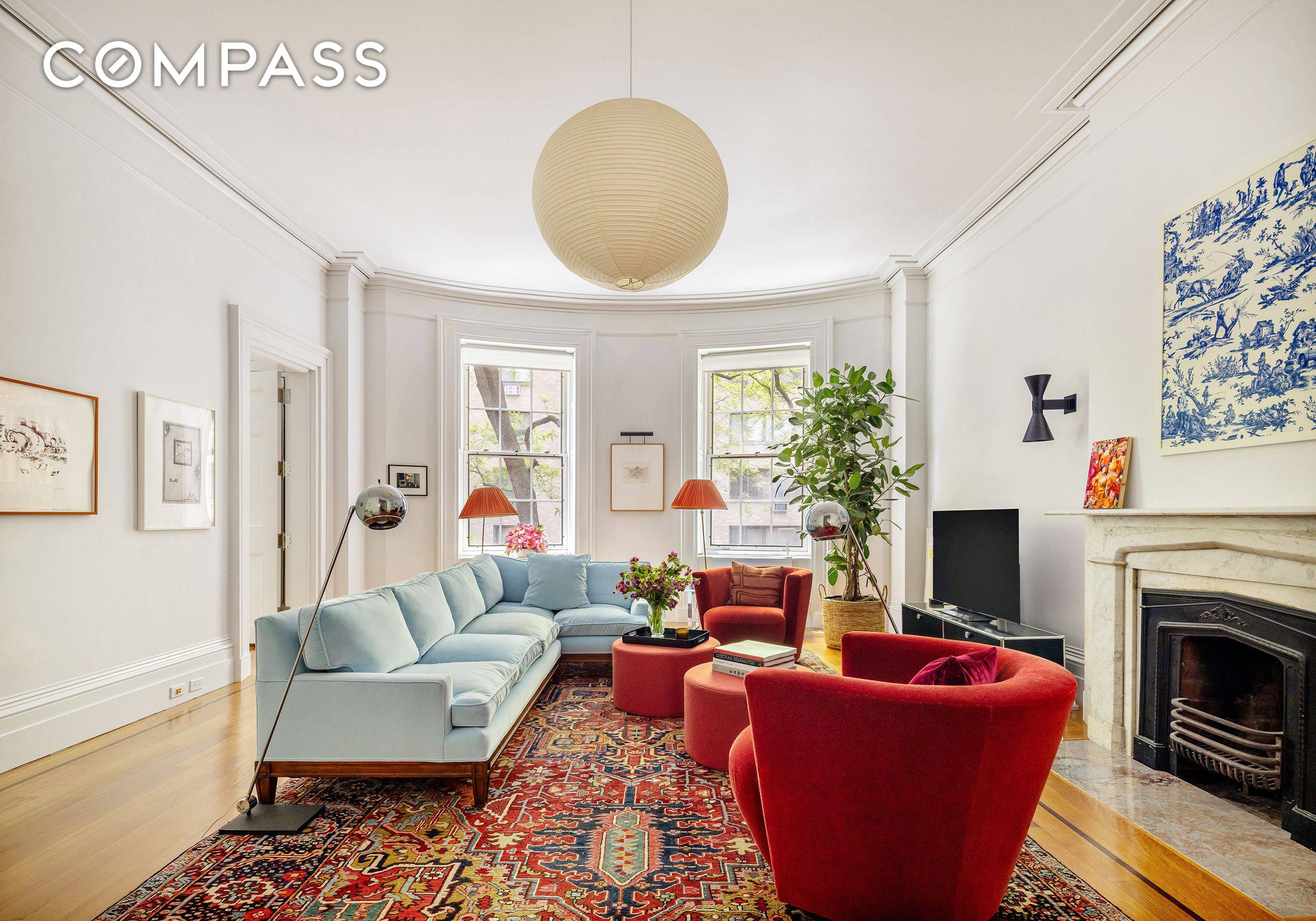 This stunning residence comprises a full floor of a grand 33 foot wide bow front townhouse.