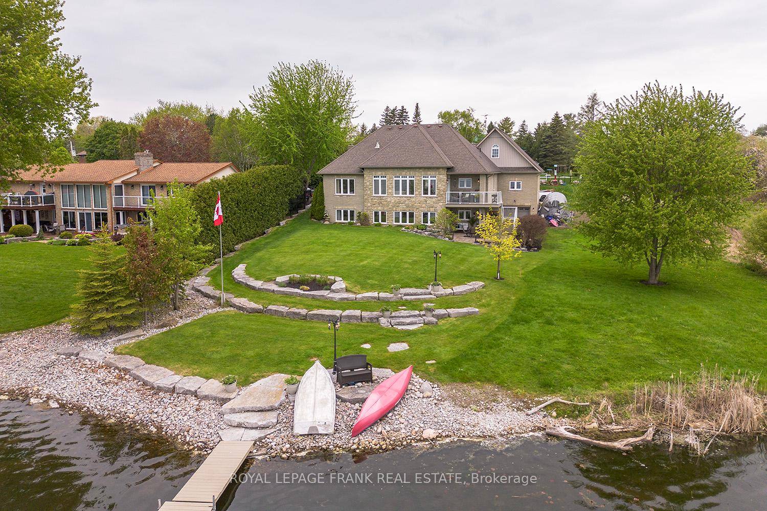 Only 15 minutes north from the historical town of Port Perry, you'll discover the perfect blend of luxury, convenience, and relaxation in this stunning Custom Built Waterfront Home !