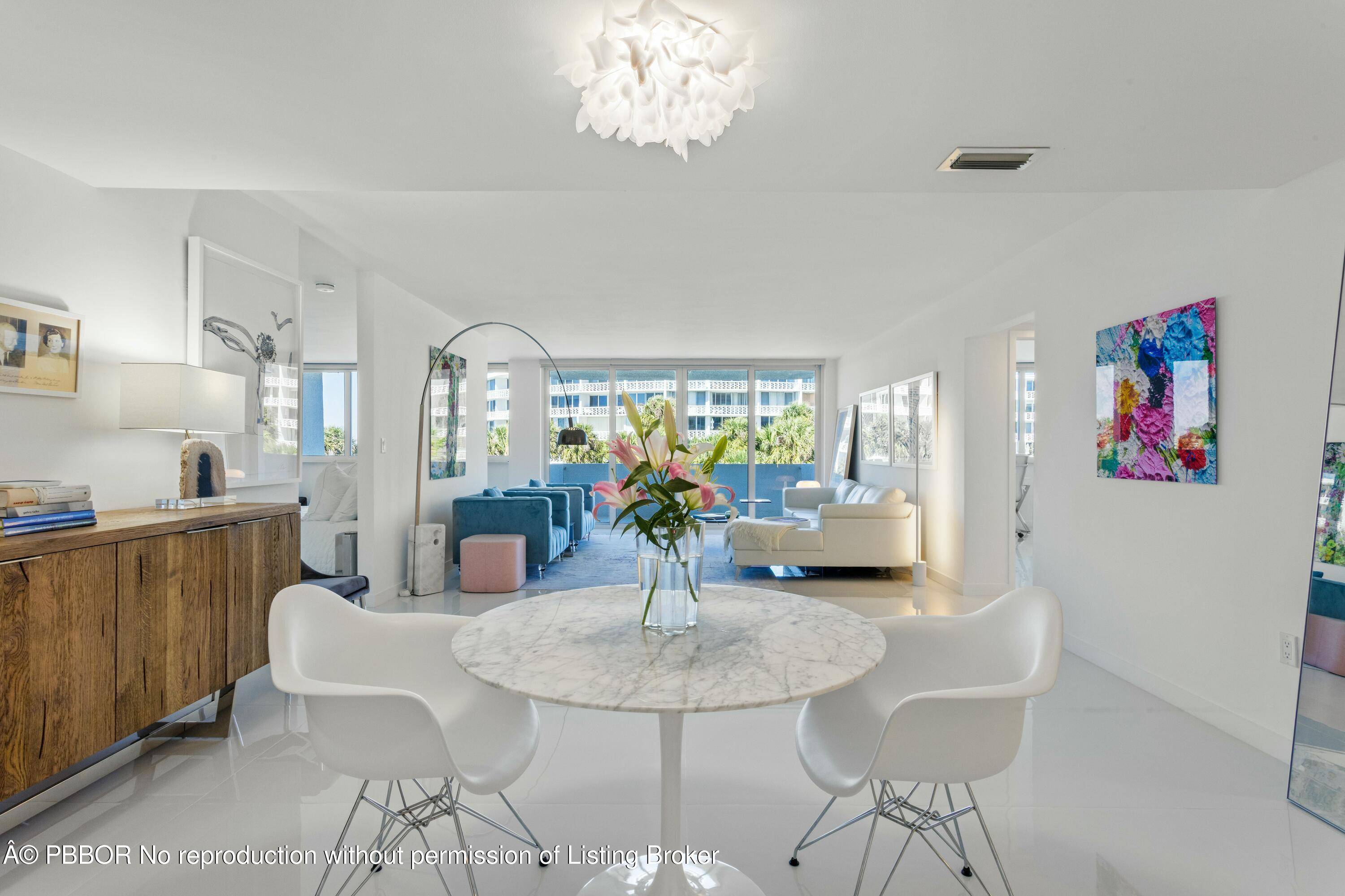 Stunning water views from this beautifully renovated Palm Beach Chic Paradise with private balcony !