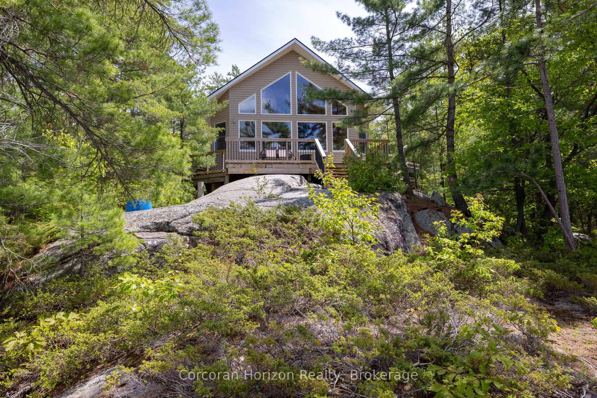 Located on sought after Six Mile Lake, this custom 2, 097 sq.