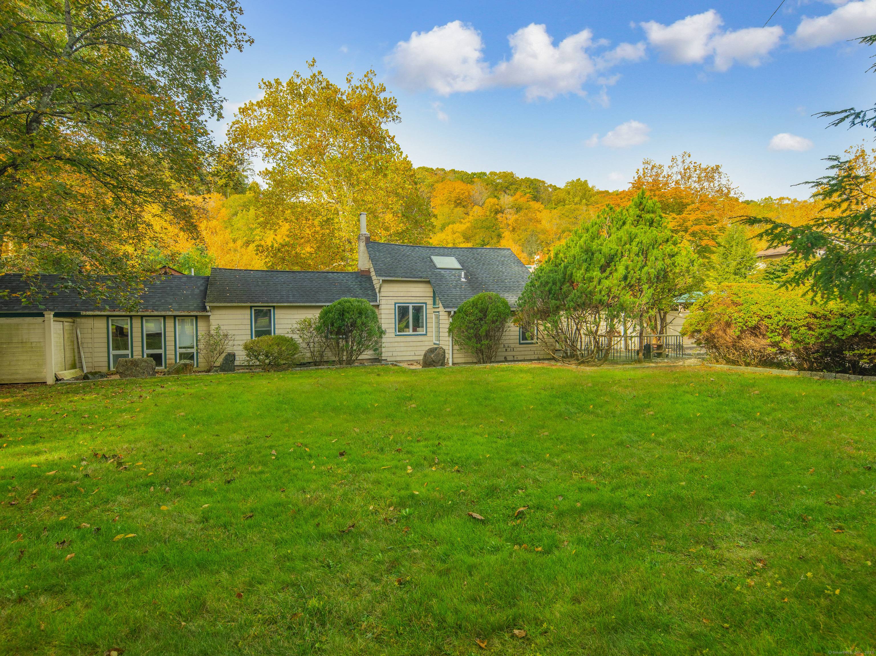 A Stunning property an extraordinary opportunity to own a charming updated New England ranch located on a spectacular 1.