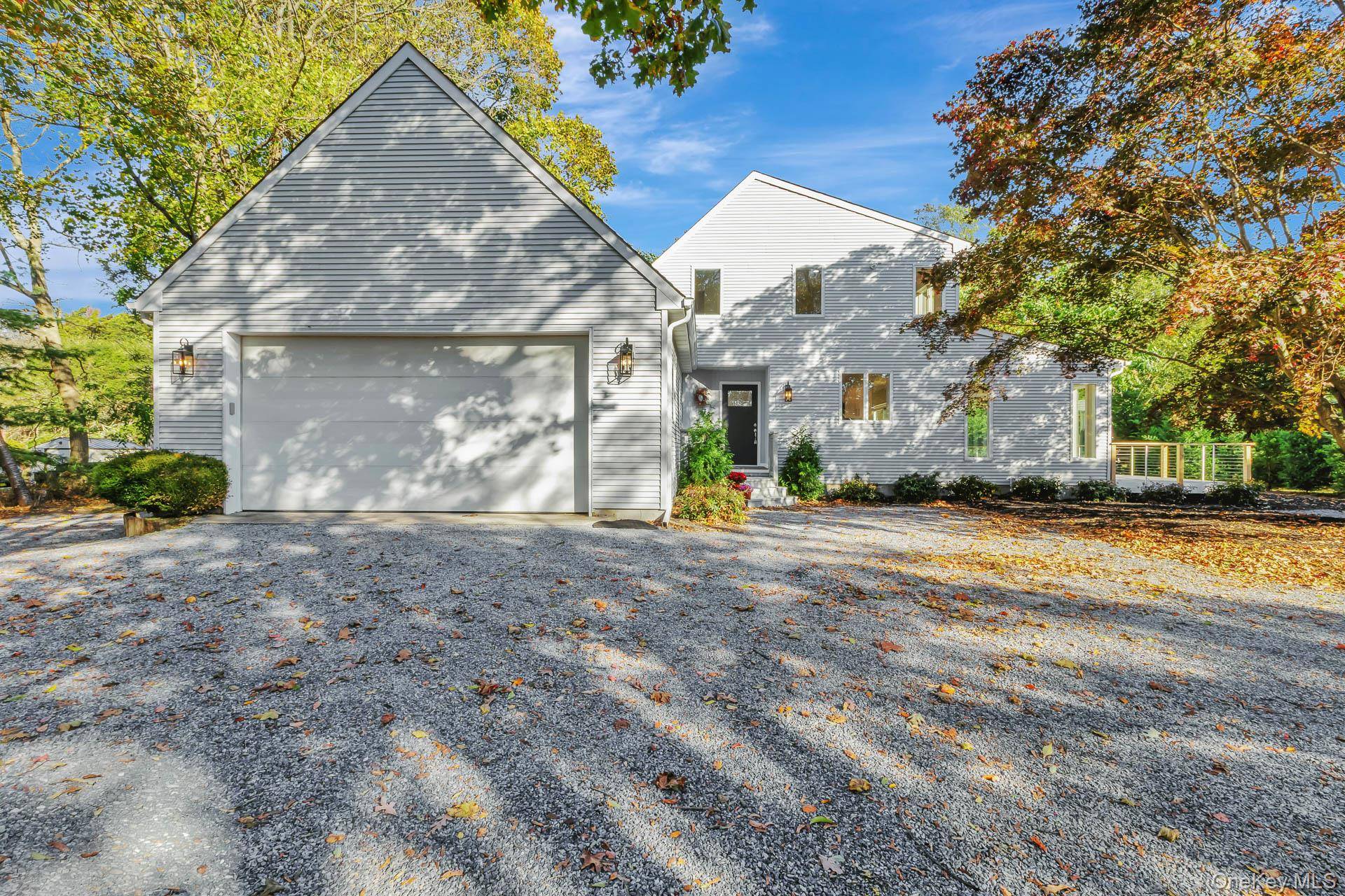 Spectacular Contemporary, on close to an acre of property offering 3Bedroom, 3.