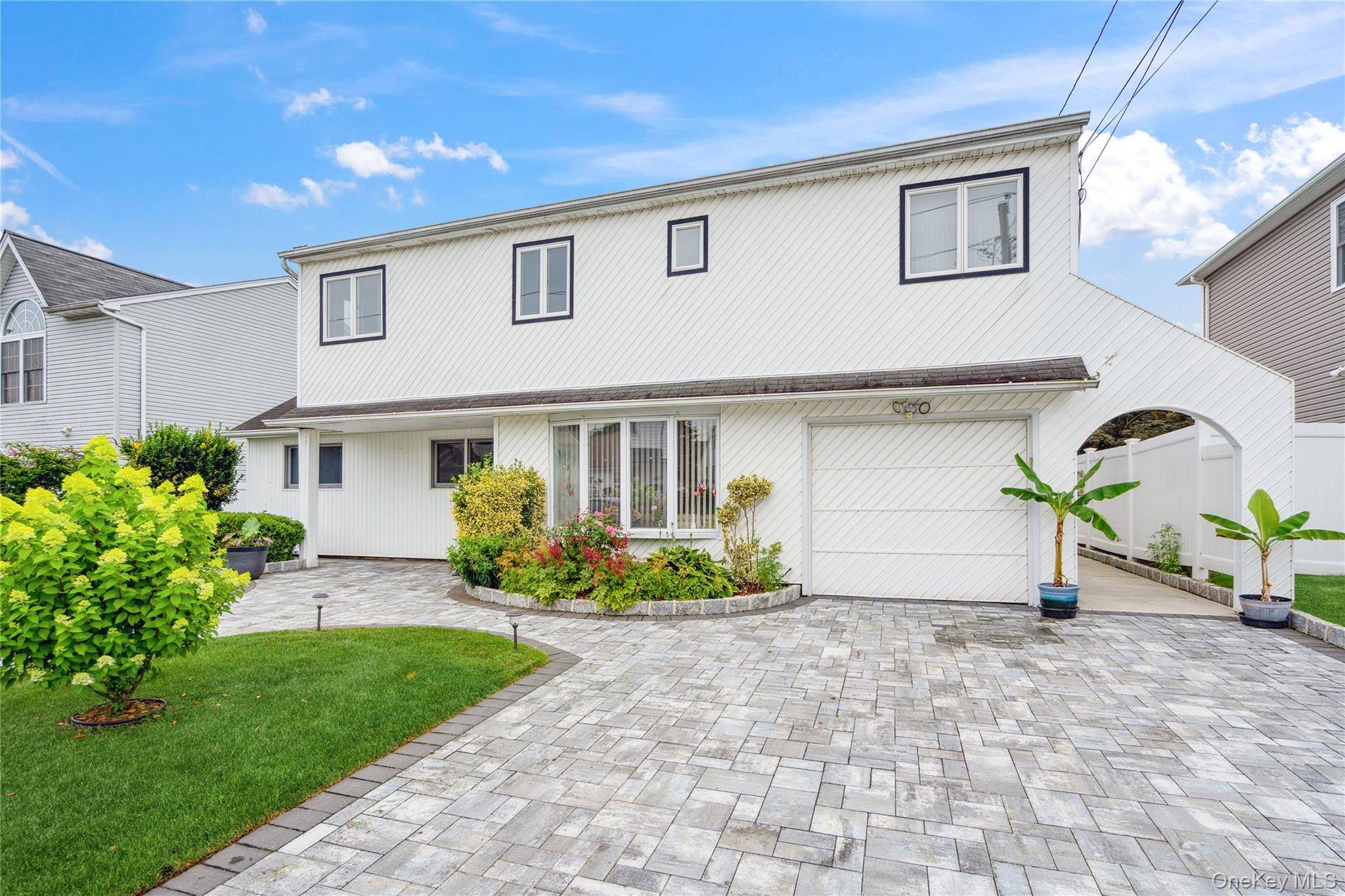 Welcome to This Spacious and Versatile Colonial !