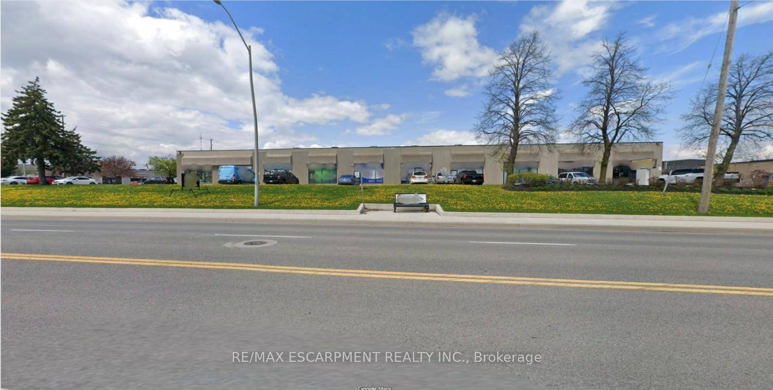 Prime location for your business on Harvester Road 2460 sq ft unit featuring 1 10'x12' drive in door.