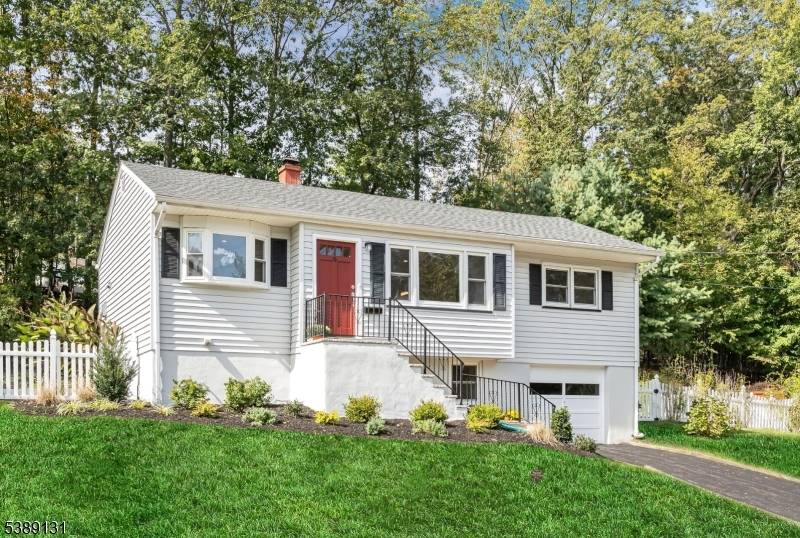 Perched on an idyllic knoll, this beautifully renovated home offers modern style, smart updates, and a convenient location in a peaceful Bloomingdale neighborhood.