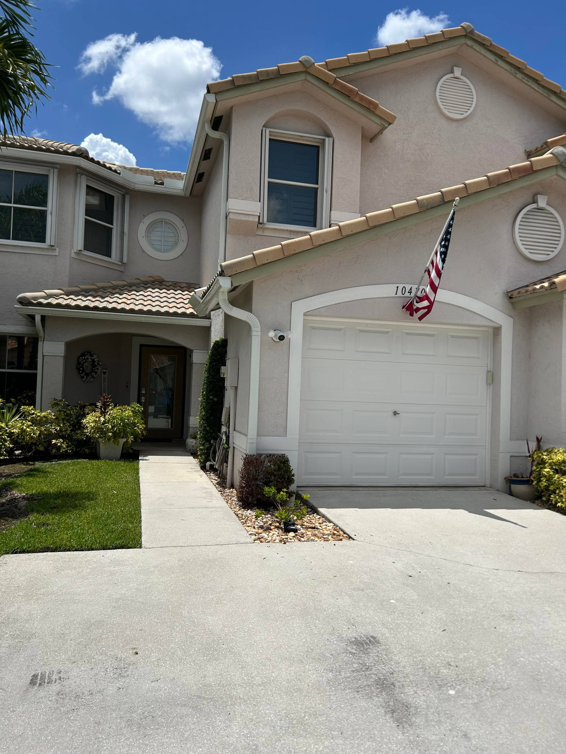 Wellington Edge gem in a quiet gated community located off Forest Hill Blvd close to shopping and amenities.