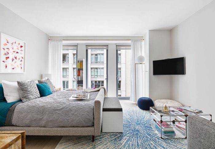 This spacious Studio features floor to ceiling windows, a gourmet kitchen with stainless steel appliances and quartz countertops, an over sized bathroom with a floating vanity, and a walk in ...