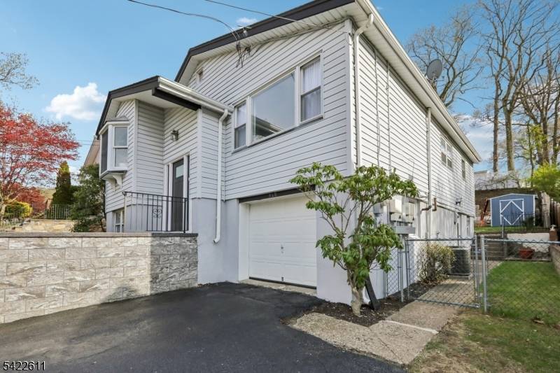 Welcome to 518 Edith Road in Landing where modern updates meet effortless living in this move in ready bi level home with a potential in law suite.