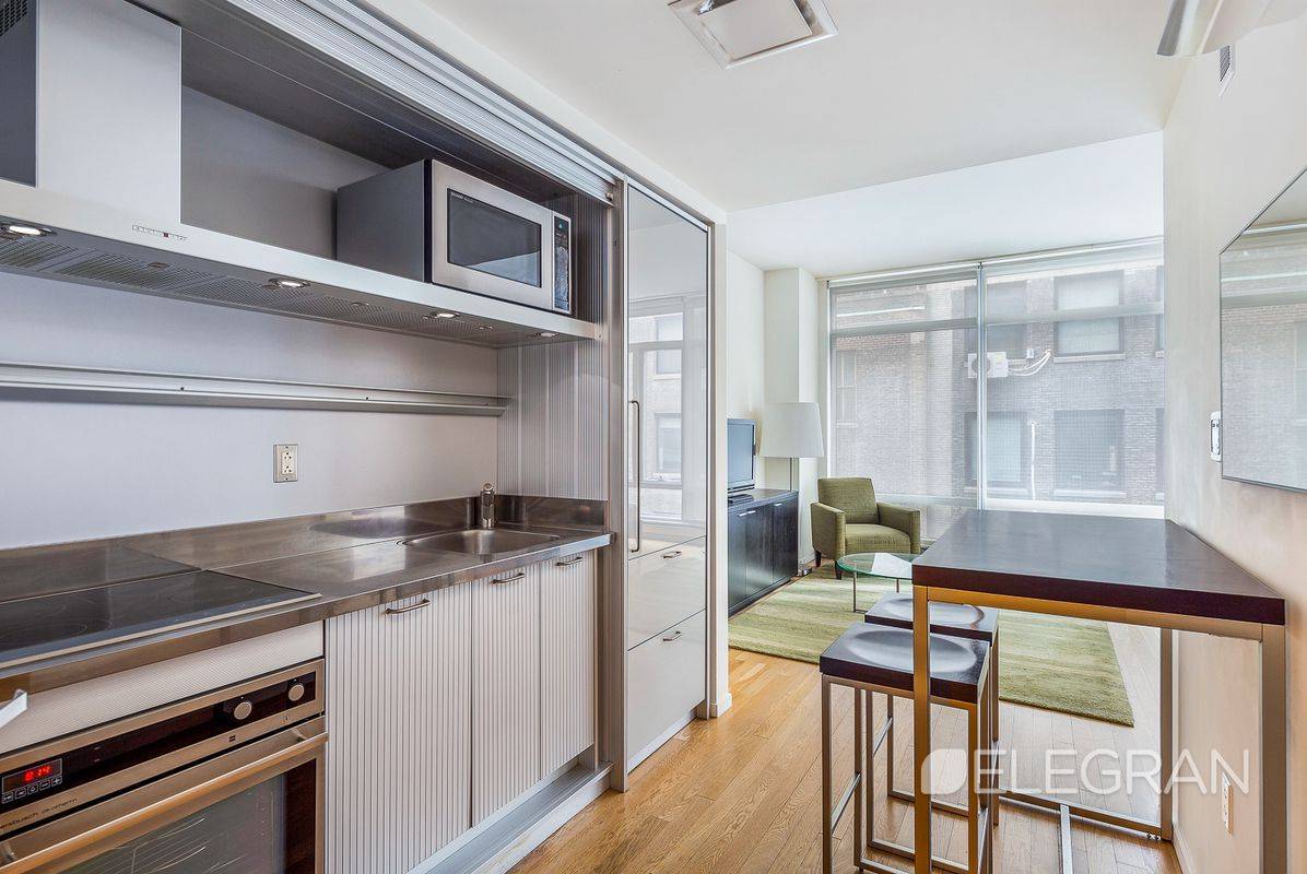 Spacious fully furnished corner big studio apartment available in a full service luxury building.
