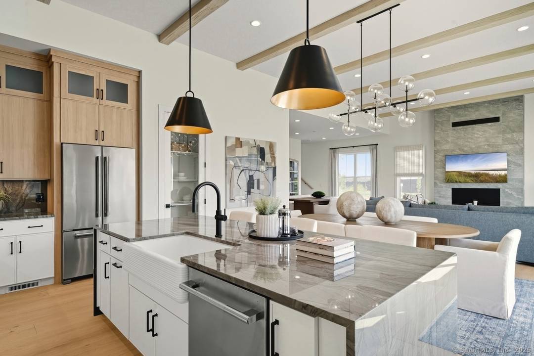 Welcome to the Aberton at 2 Foxwood Drive, where luxury living is designed for gathering, celebrating, and feeling at home.