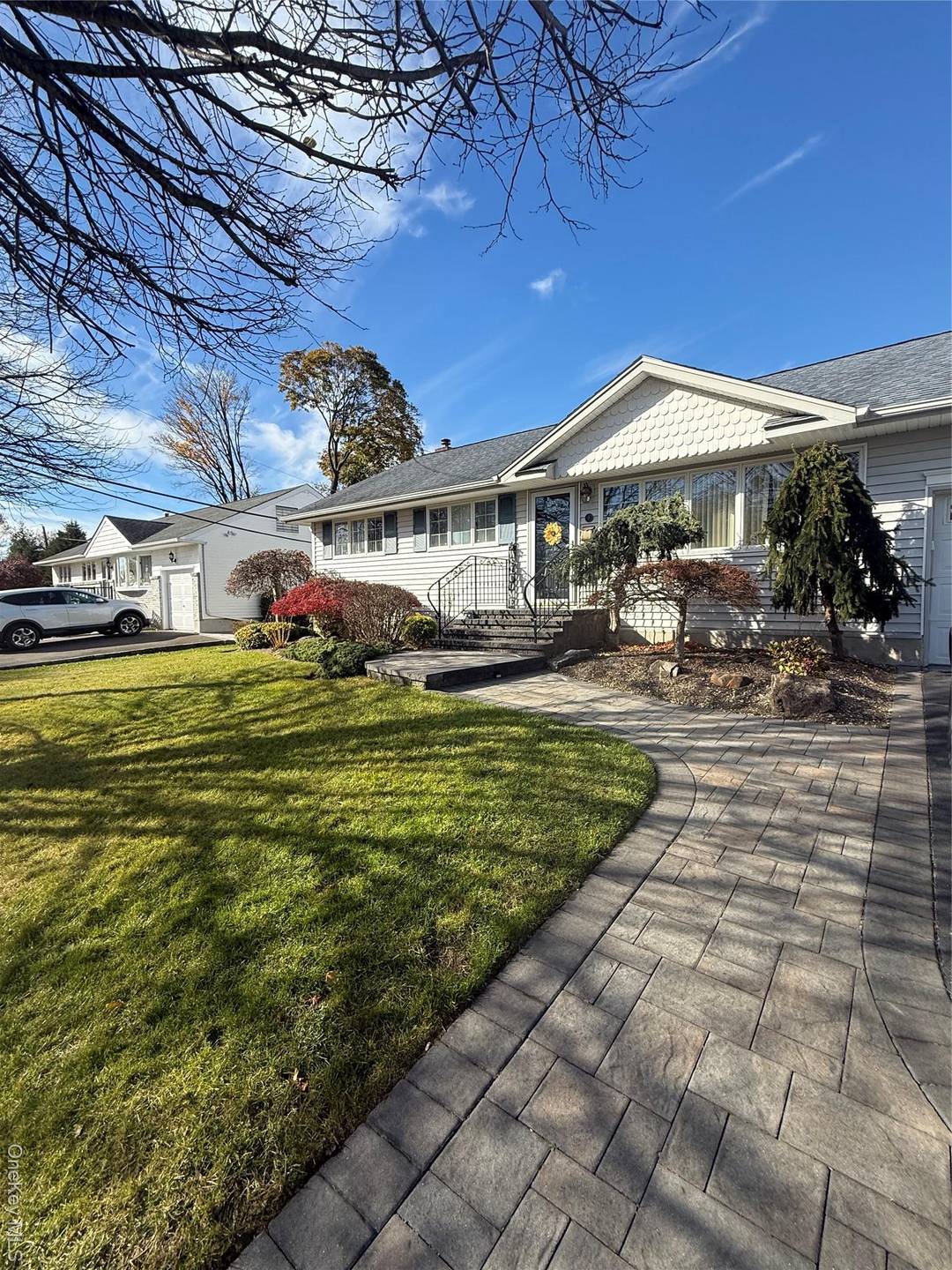 Welcome to this beautifully maintained and expanded Eileen Garden Ranch located in the heart of old bethpage and within the sought after Plainview School District.
