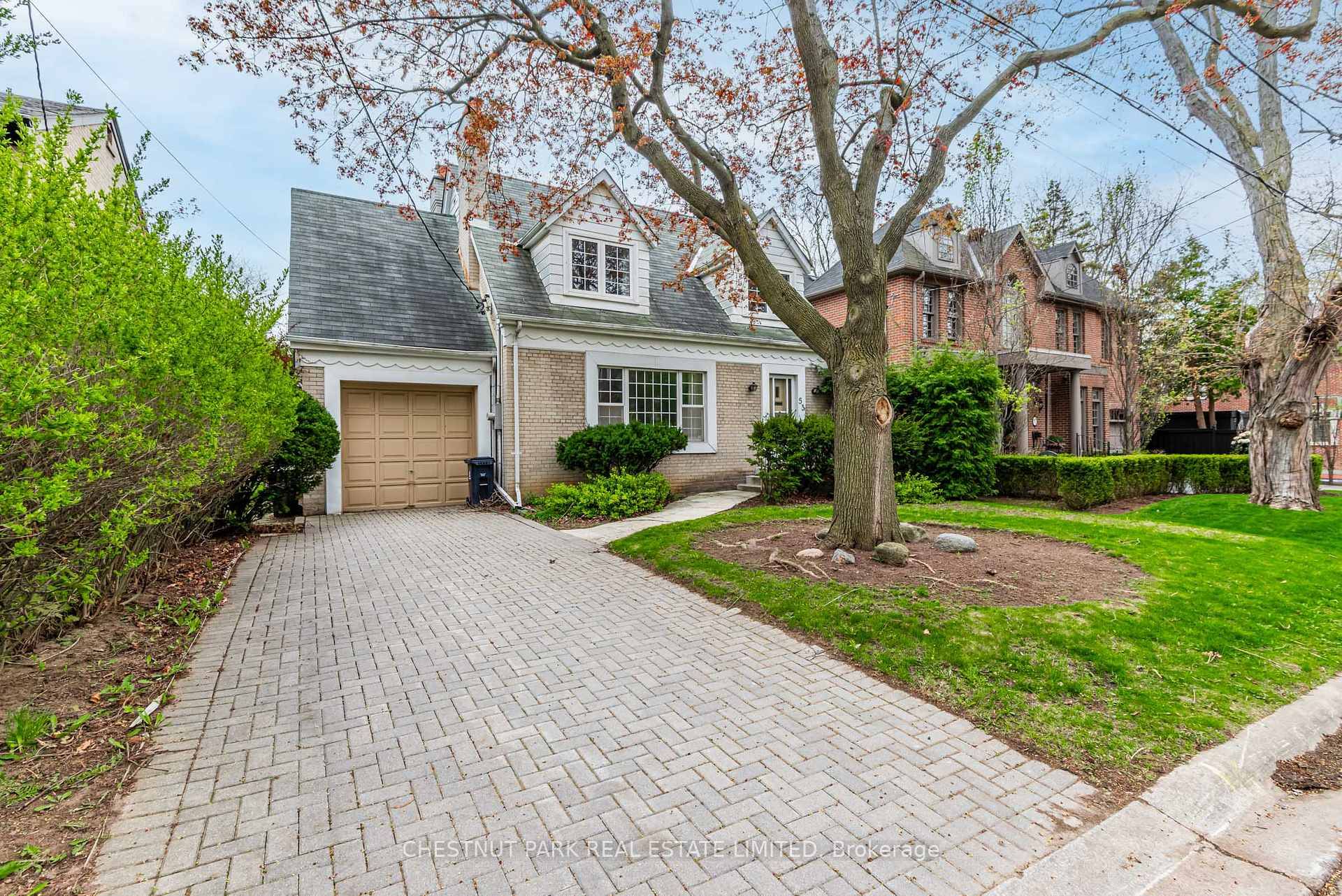 Charming 7 room, 1 1 2 storey home on a wide 50' lot.