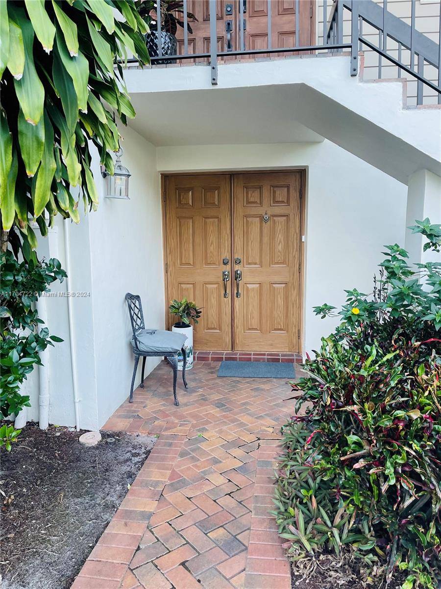 Rarely available ground floor Lakewood Gardens condo.