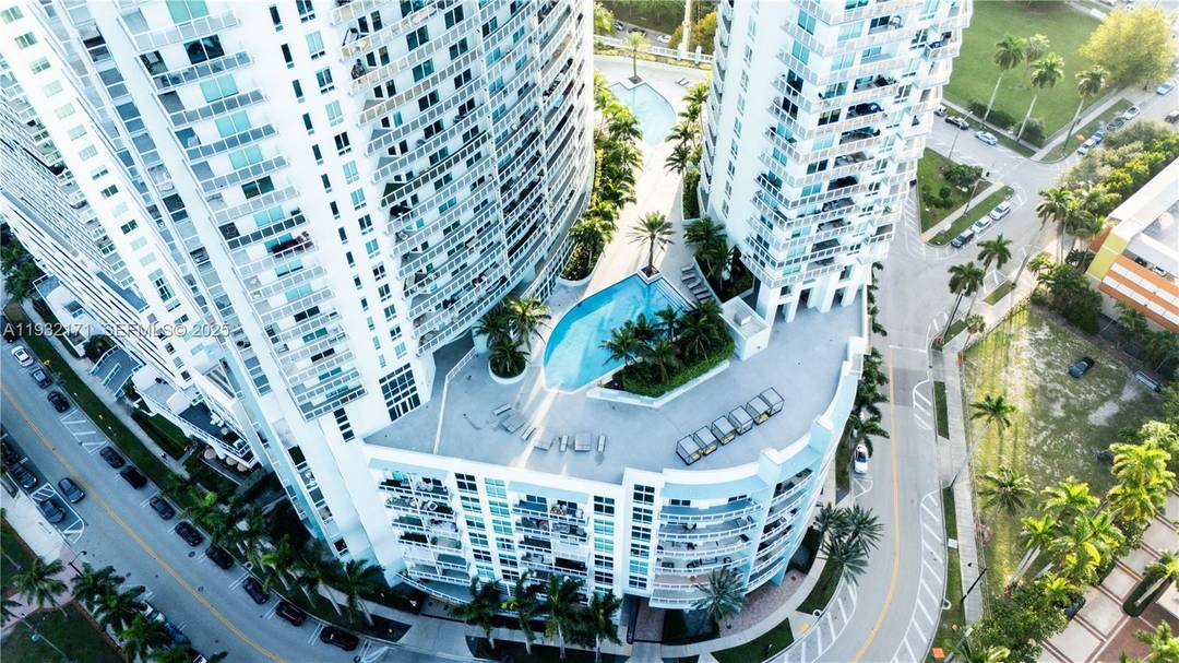 Highly desirable split floor plan with spacious walk in closets, gourmet kitchen with island, washer and dryer in unit, and floor to ceiling windows.