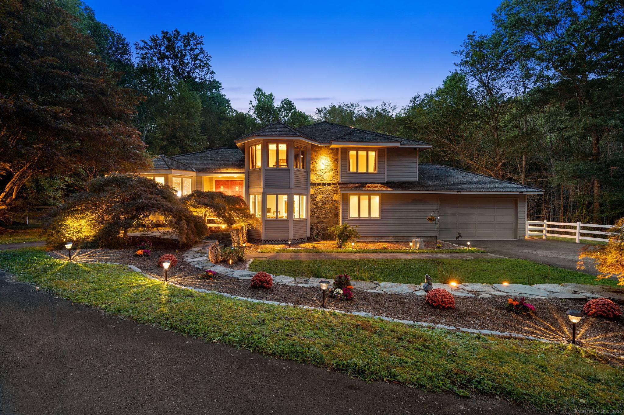 Tucked away in the picturesque hills of Litchfield County, right on the desirable Woodbury Roxbury line, this stunning Colonial Contemporary residence offers an unparalleled blend of privacy, natural beauty, and ...