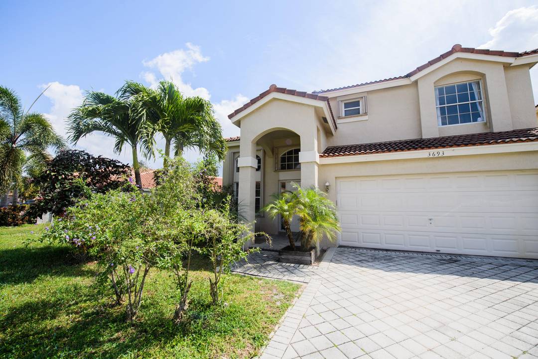 Spacious 4 Bedroom Home in the Desirable Grand Isles Community in Wellington, FL.