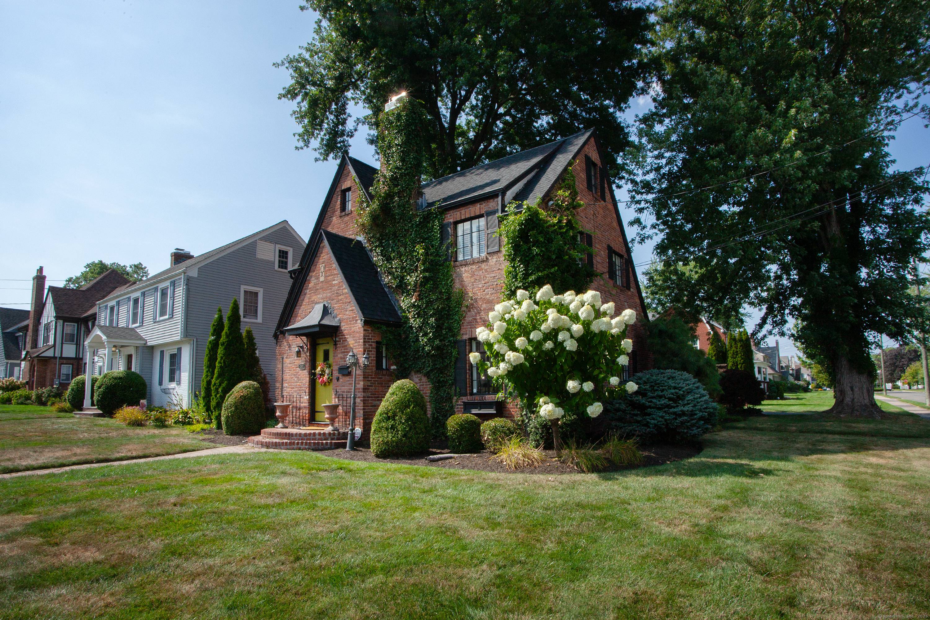 This stunning brick tudor is a jewel in the heart of West Hartford center !