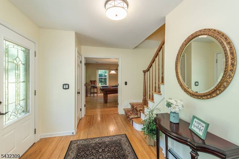 This stunning 4 bedroom Colonial in desirable Bennington Neighborhood offers spacious living throughout !