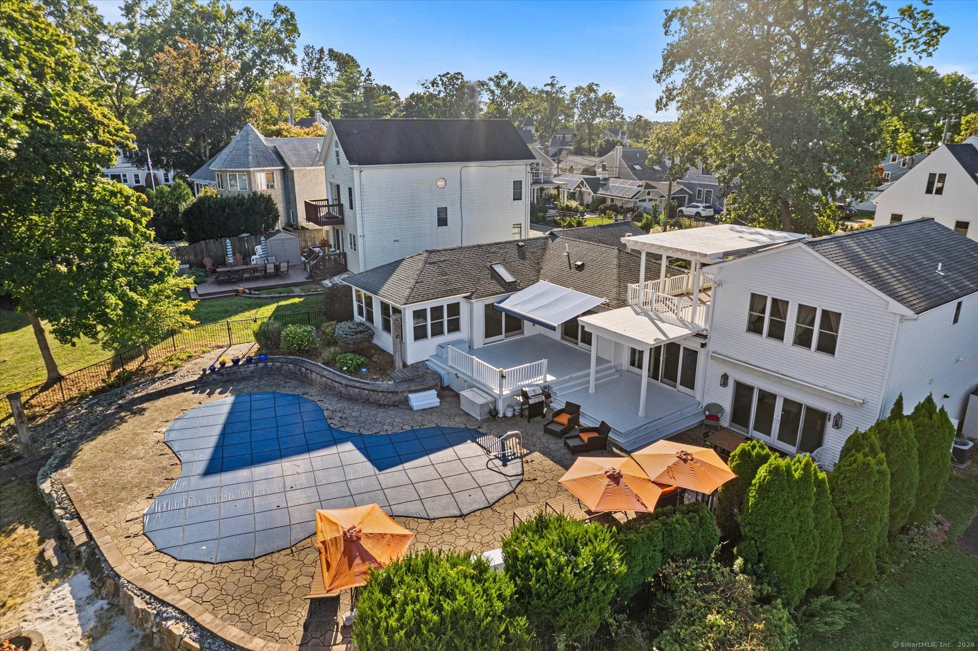 Experience year round living in this beautifully appointed waterfront home offering panoramic bay views, deeded beach rights, and resort style amenities.