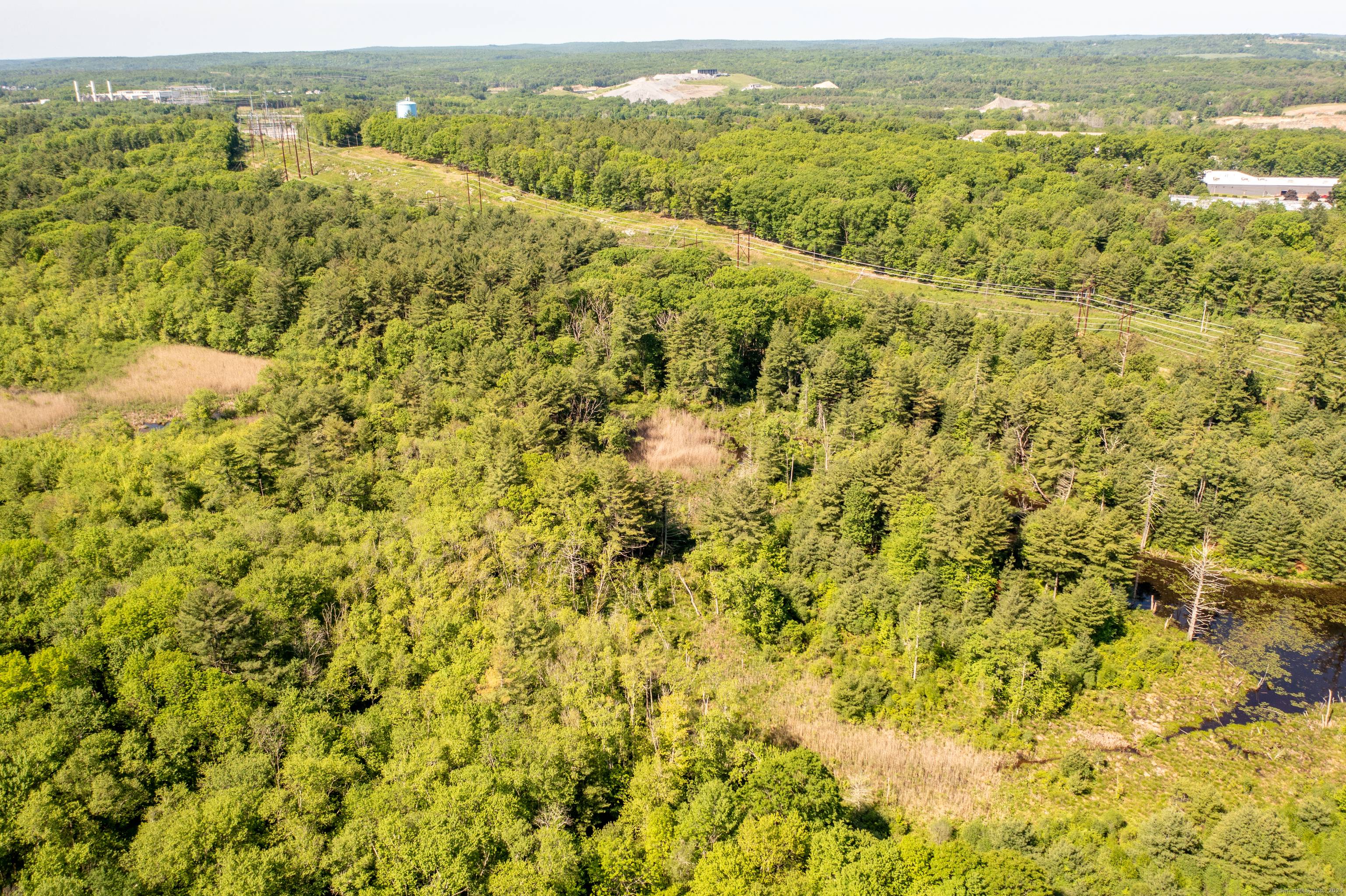 Discover a prime opportunity for a 55 and older condo development on this expansive 47 acre parcel of land.