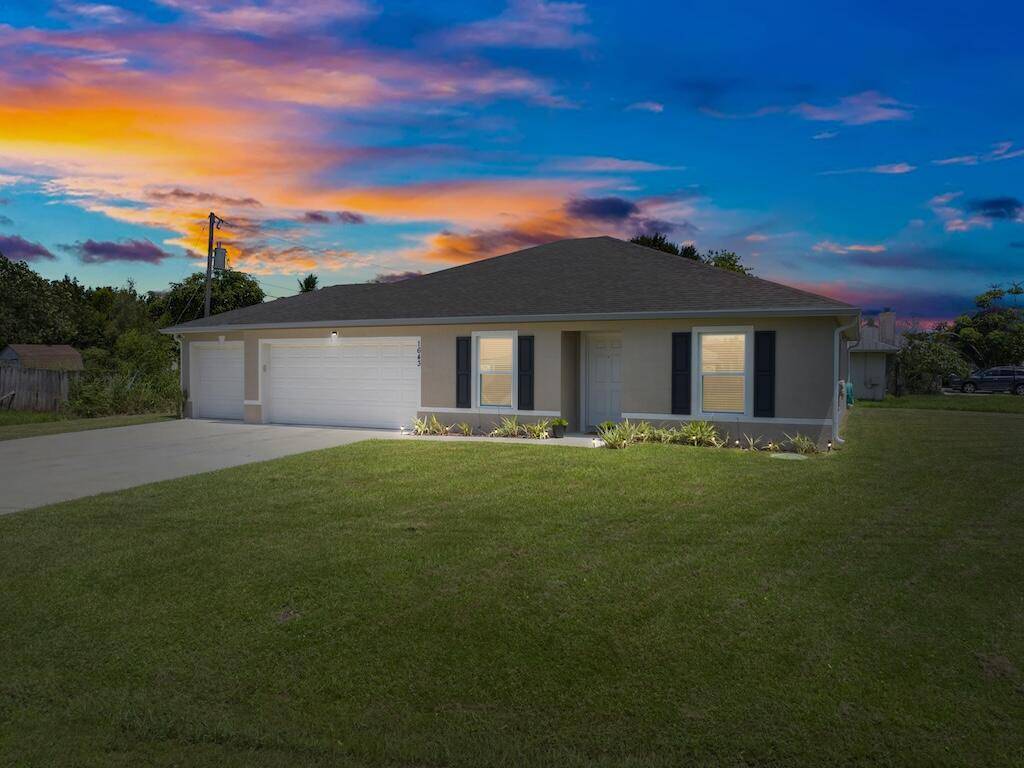 Stunning 2023 build on a spacious corner lot with a 3 car garage !