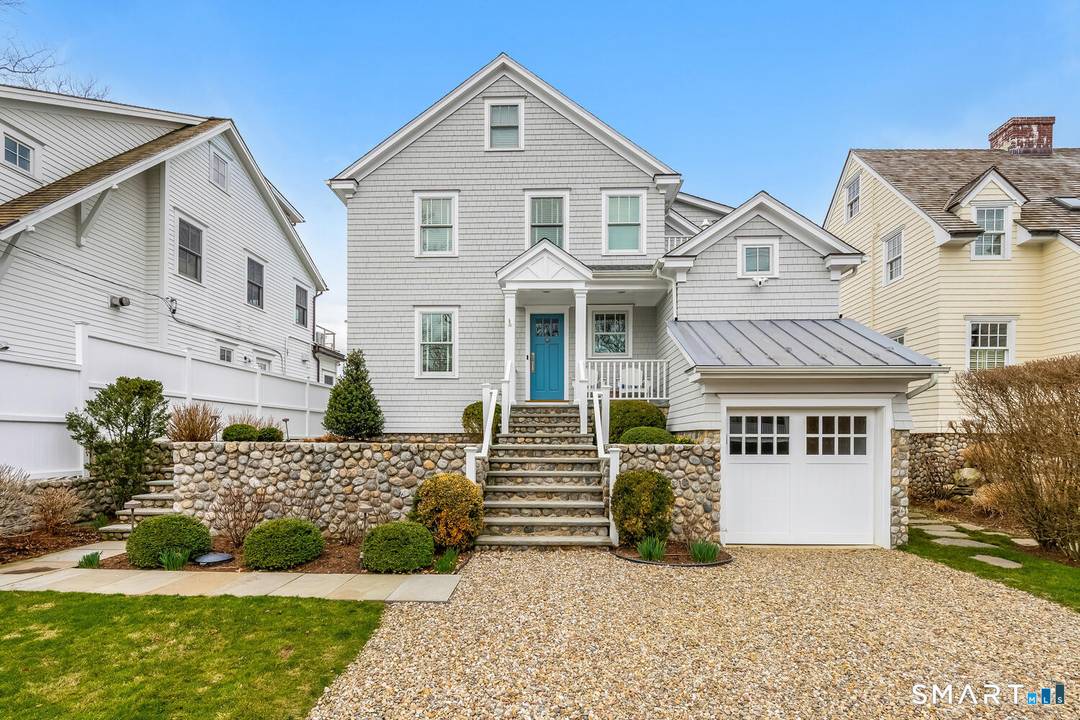 Set along the picturesque Five Mile River with its own private beach and dock, this exceptional waterfront home captures sweeping views of the Long Island Sound and unforgettable sunsets from ...