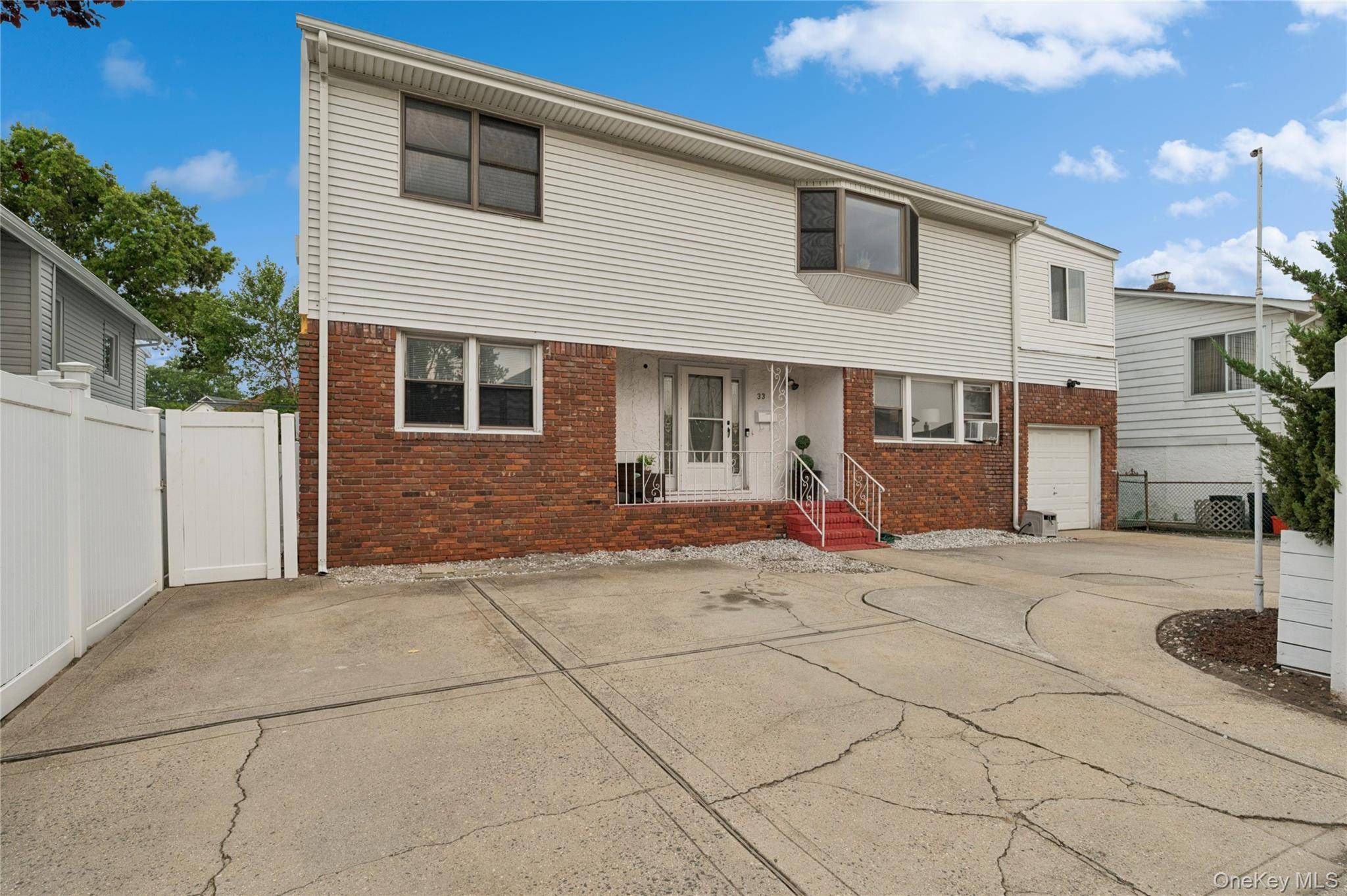 SHOWINGS BEGIN SAT 8 16 Welcome to this spacious and beautifully updated home located in the Village of Island Park !
