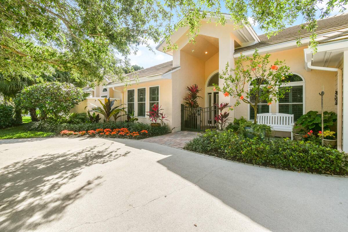 Located on a spacious. 39 acre lot in a highly sought after GATED community with only 37 homes, this beautiful WATERFRONT property offers unparalleled access to the Intracoastal Waterway with ...
