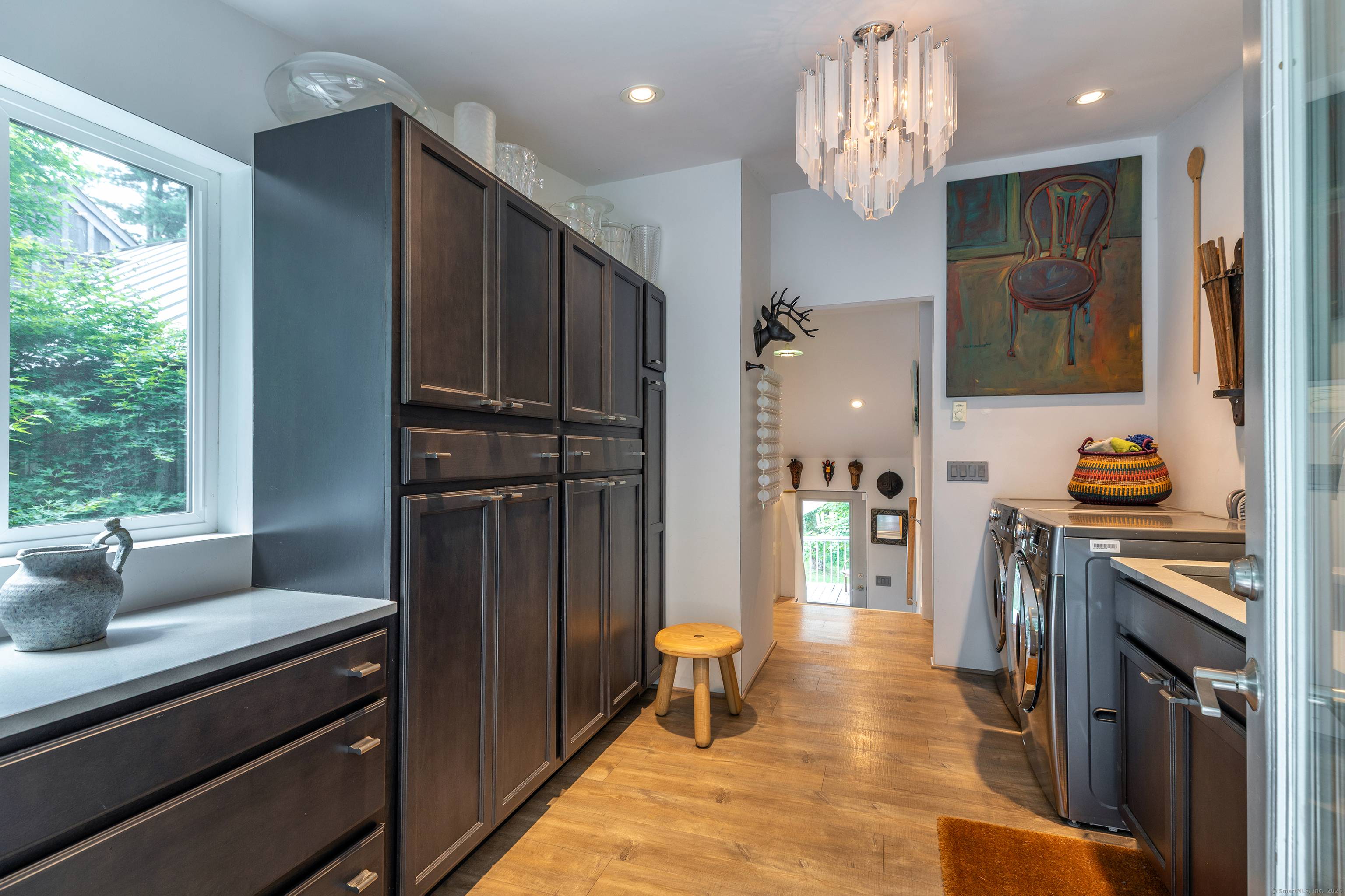Tucked away on 3. 28 pristine acres in Connecticut's rolling countryside, this captivating residence offers a rare opportunity to own a place where nature, serenity, creative energy converge in perfect ...