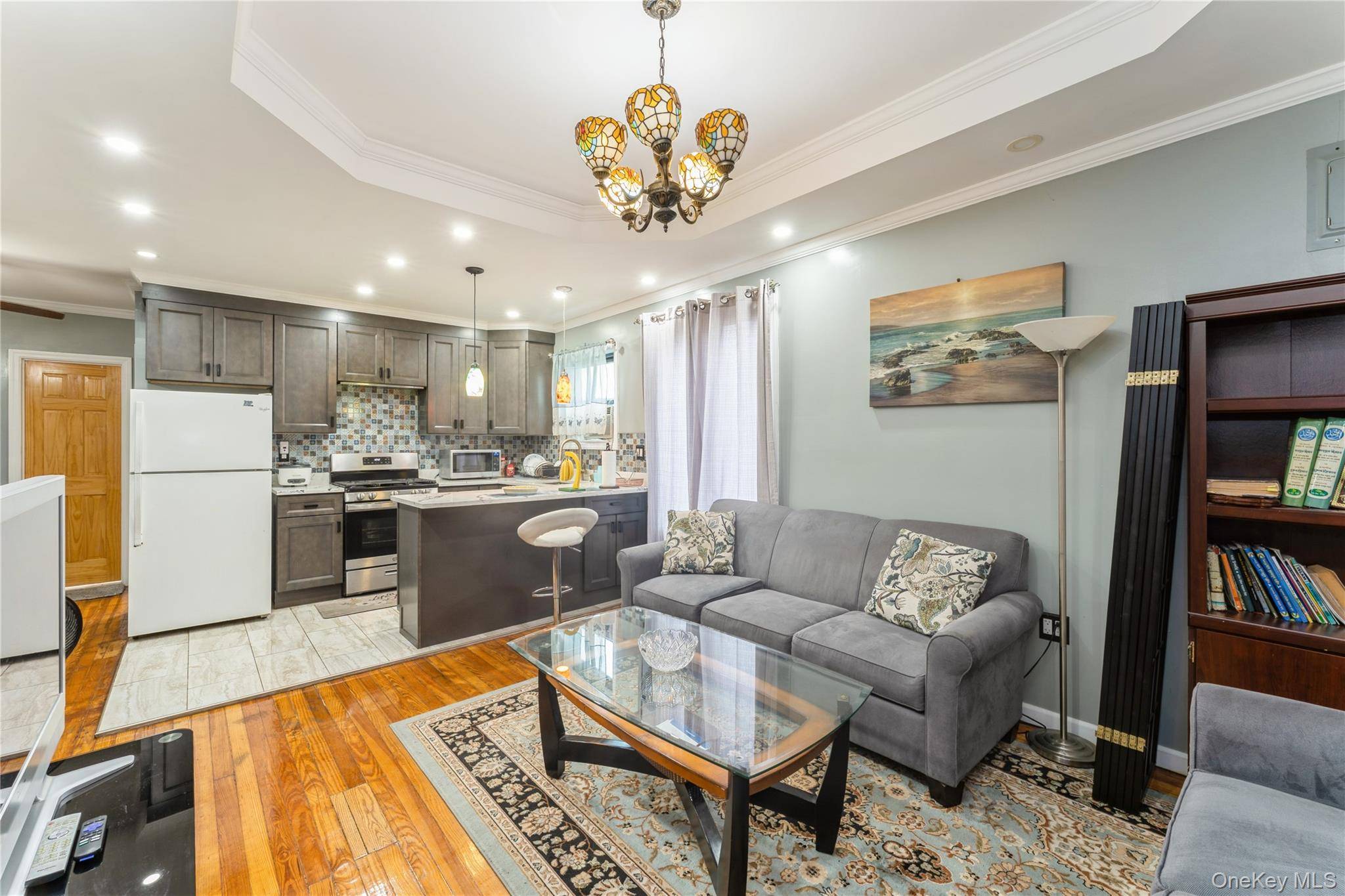 Carefully Maintained 2 Family Home On a Quiet Block That Offers Modern Comfort And Style.