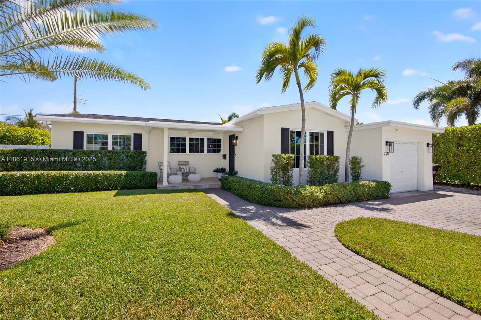 Welcome to 220 Rutland Boulevard, where Old Florida charm meets relaxed coastal living.