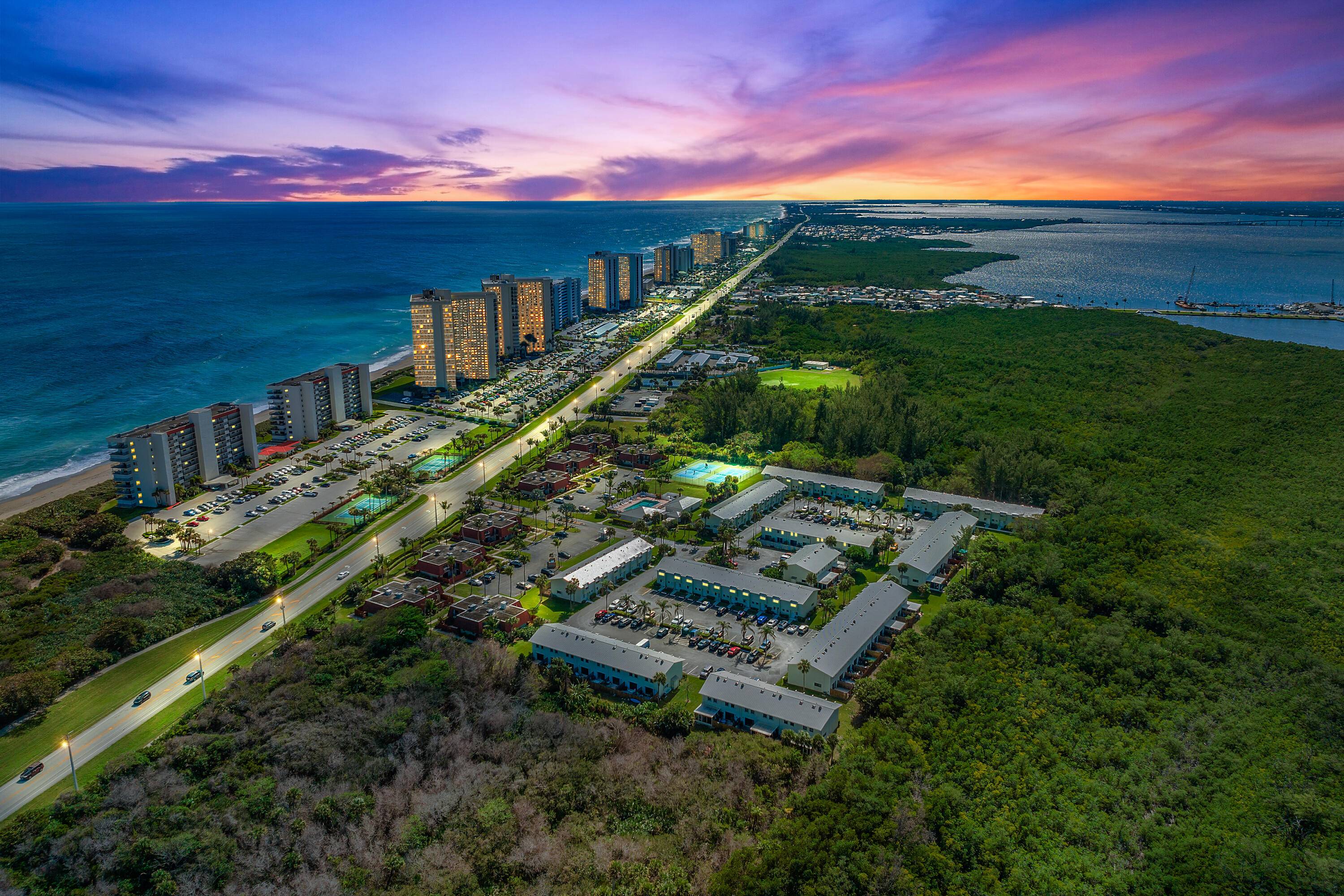 Experience coastal living at its finest in this fully renovated, turnkey condo with private beach access in Island Village.