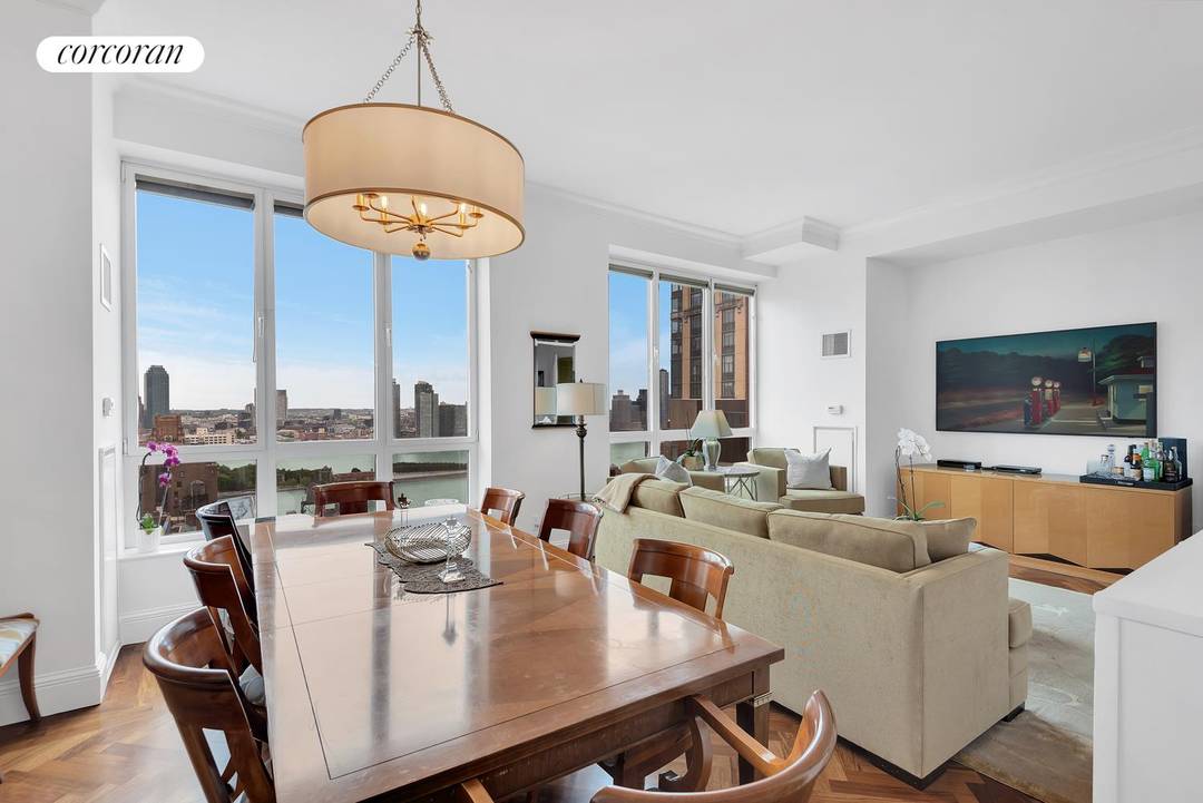 Penthouse 7A is a beautiful and oversized, sun filled home that is filled with modern amenities and a gracious and flexible layout to suit every need.