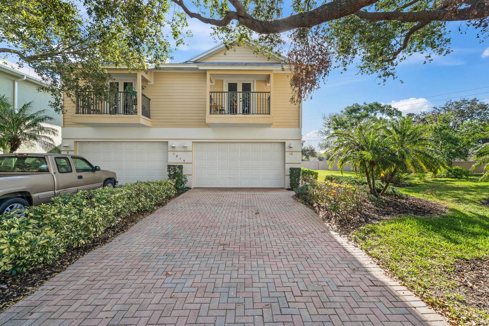 SPACIOUS CORNER HOME WITH TWO MASTER BEDROOMS LOCATED ACROSS FROM POOL AND TENNIS COURTS.