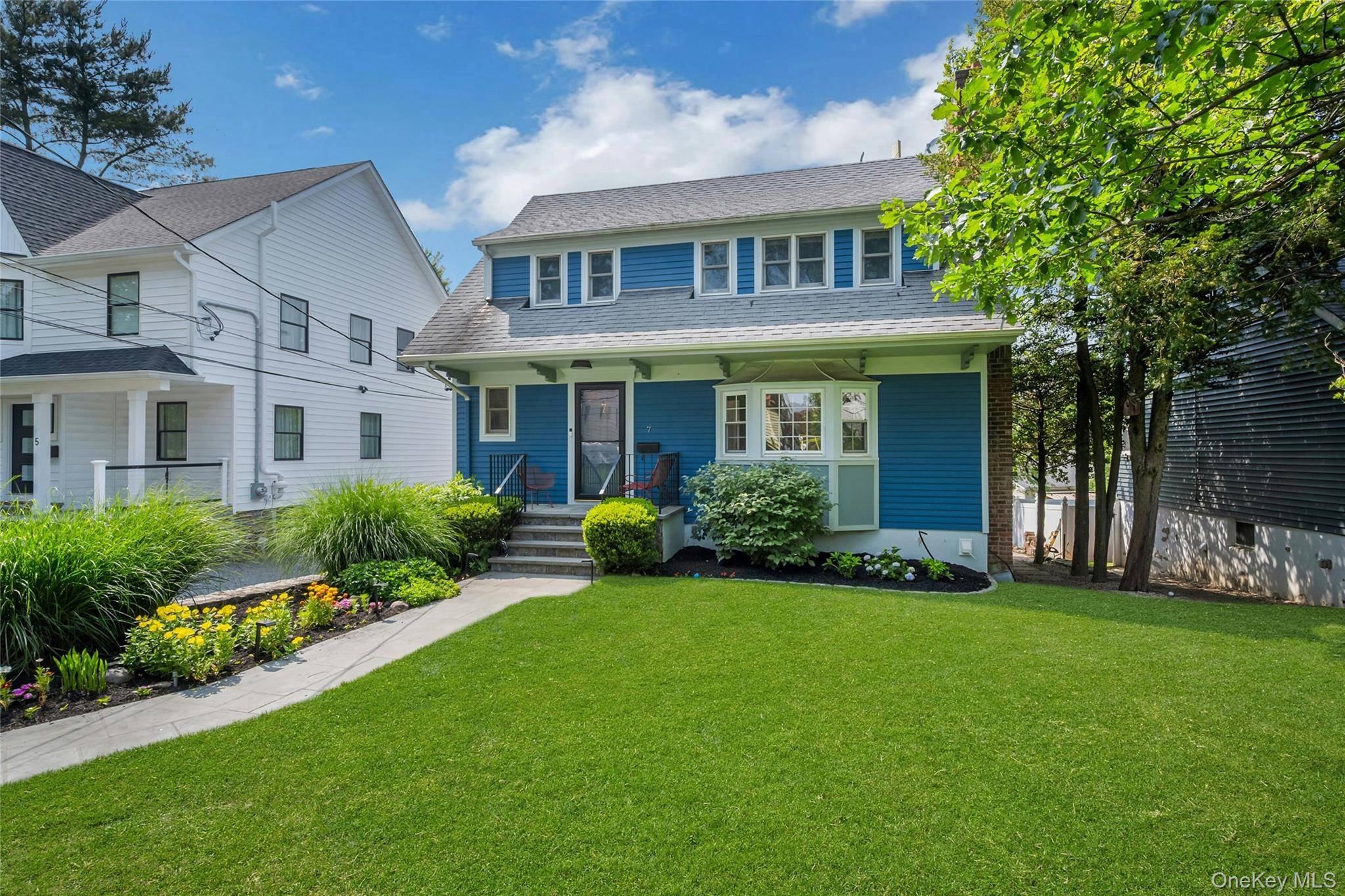 Welcome to 7 Senate Place a beautifully updated home tucked on a peaceful cul de sac in the heart of Larchmont.