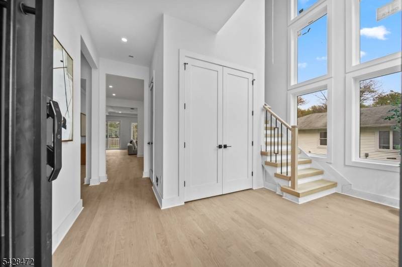 52 Congressional is an exceptional 4, 700 sq ft new construction home offering 6 bedrooms and 5.