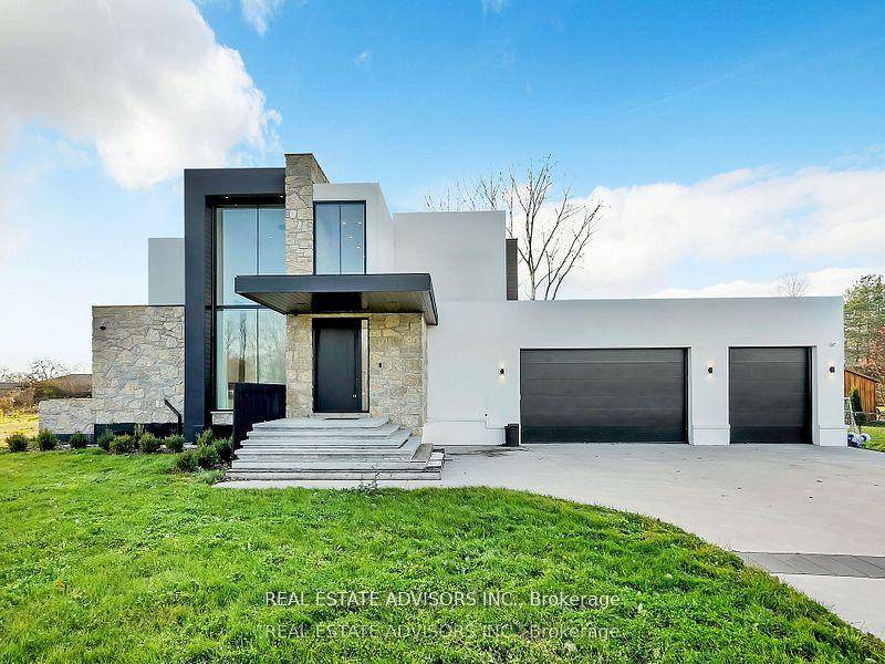 Experience luxury living in this ultra modern, 5200 sq.