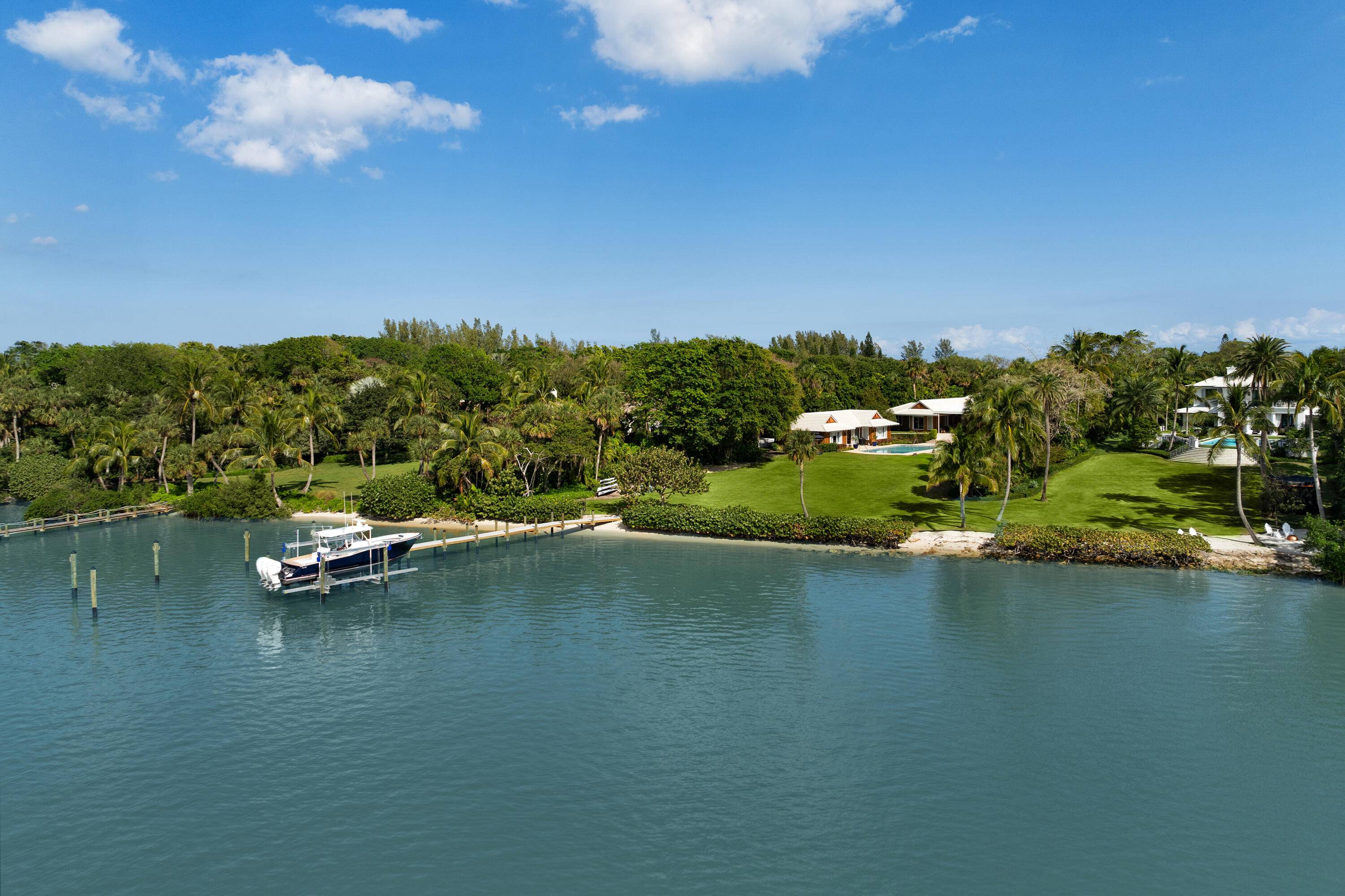 A rare ocean to intracoastal estate on Jupiter Island's exclusive Gold Coast.