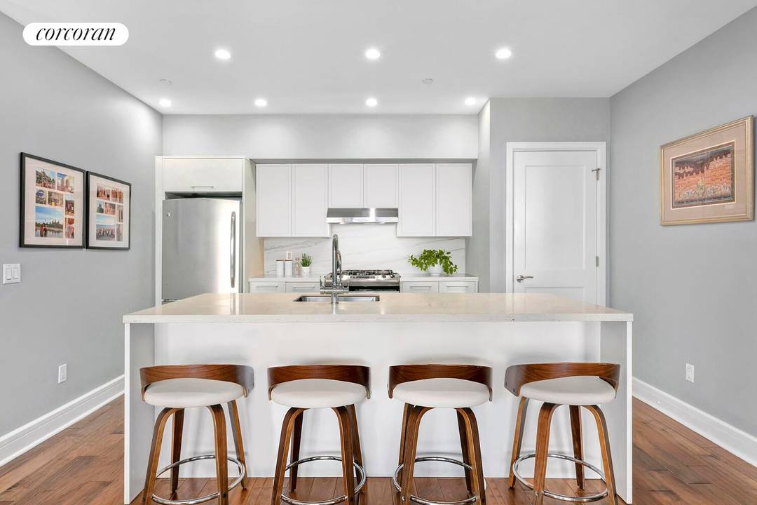 Enjoy the best of Harlem in this bright and spacious two bedroom, two bathroom home with magnificent views of historic brick townhouses and a tree lined boulevard.