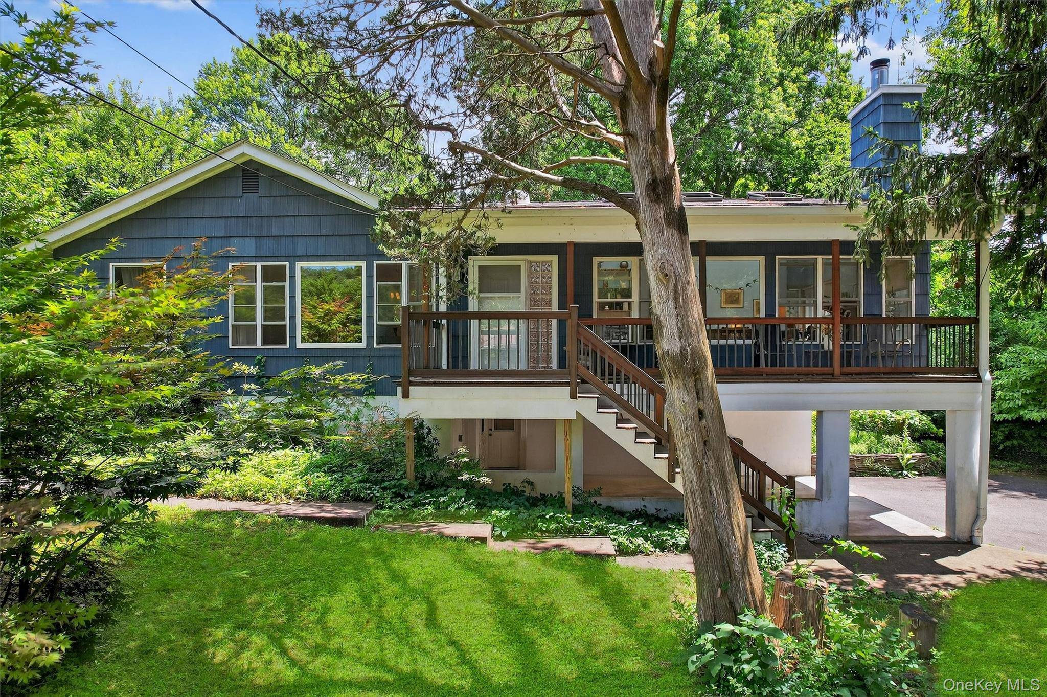 Nestled in nature, welcome to your private sanctuary in the heart of the highly desirable Merriewold Lake community in South Blooming Grove where serenity meets thoughtful design and comfort.
