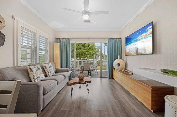 This elegant villa is perfectly situated just steps from the Sunset Pool, offering breathtaking water views.