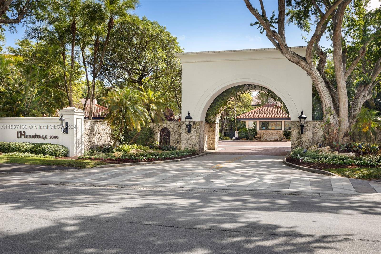 Stunning tri level villa in L Hermitage, a 24 7 guard gated community on Biscayne Bay.