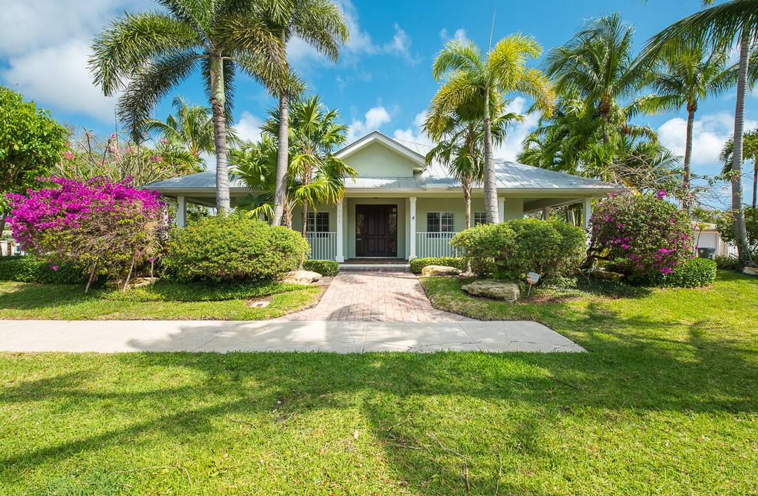 Beautifully upgraded East Boca pool home with a large back yard.