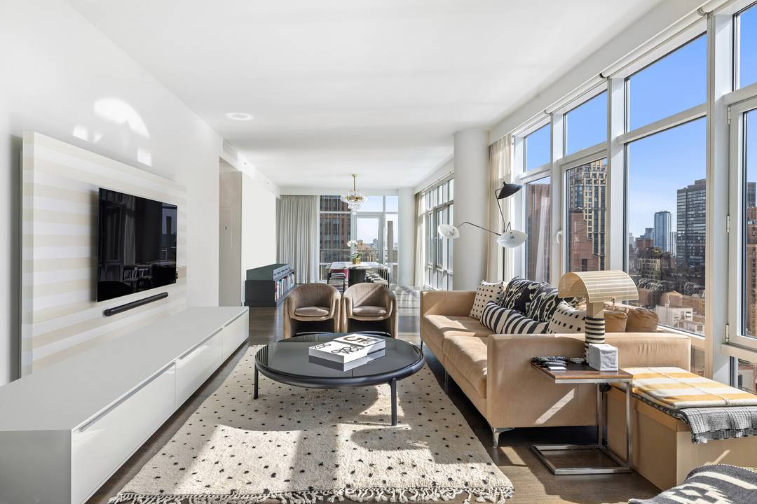 Sprawling, stunning and luxurious corner unit, this modern 3 bedroom, 3.