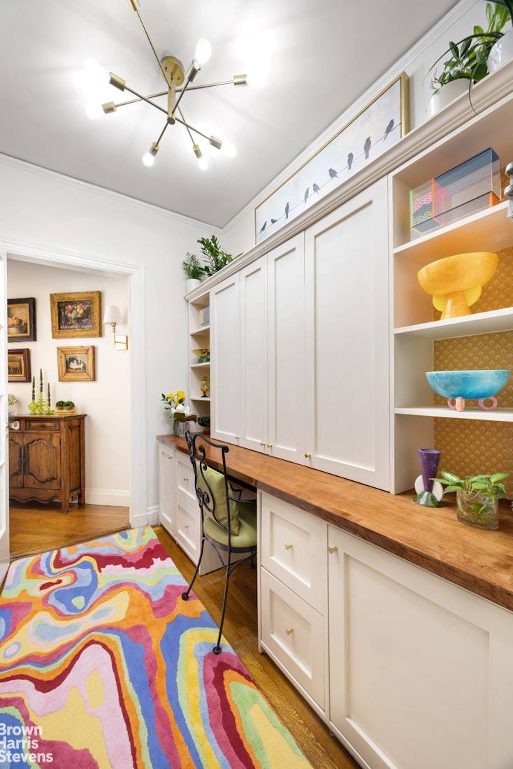 7A at 1349 Lex, a full service prewar doorman building, boasts 10' ceilings, a large windowed eat in kitchen, French doors and moldings, decorative fireplace, windowed bathroom, and wood floors ...